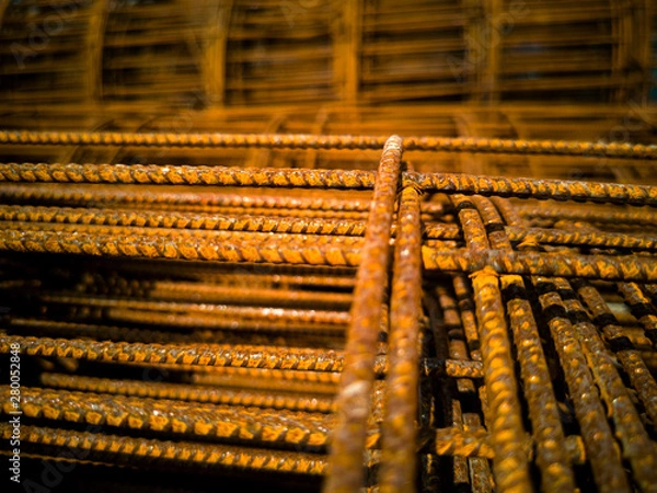 Fototapeta Roll bars that have become rusty orange construction in the area