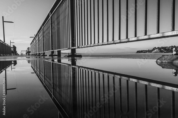 Fototapeta pier railings reflection