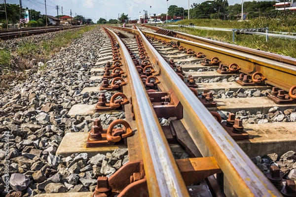 Fototapeta Two railway tracks merge together.