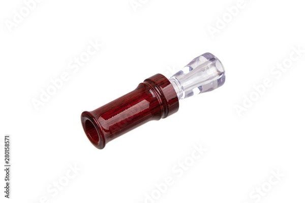 Fototapeta Hunting decoy on a white background. Decoy duck. Hunting duck call isolated on white back.