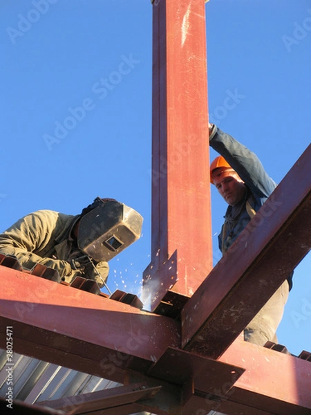 Obraz Welders working on construction site