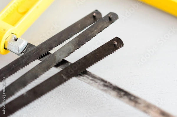 Obraz Small hand saw with spare blades for wood and metall