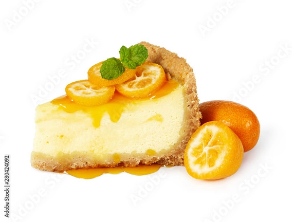 Fototapeta Piece of cheesecake with fresh kumquat and mint