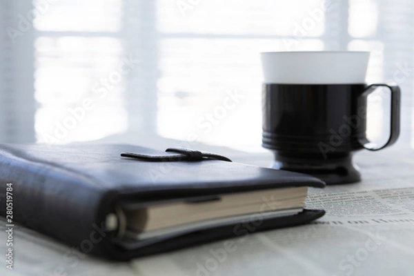 Fototapeta 手帳のあるビジネスデスク