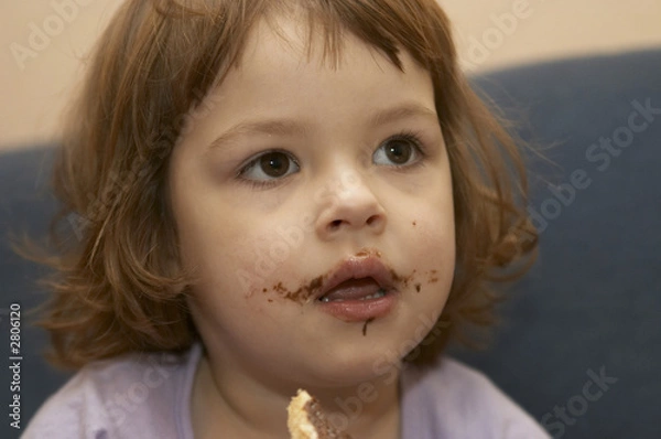 Fototapeta eating chocolate sandwich