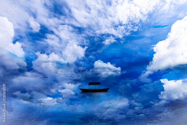 Obraz Beautiful Lake and single Boat with surround clouds.