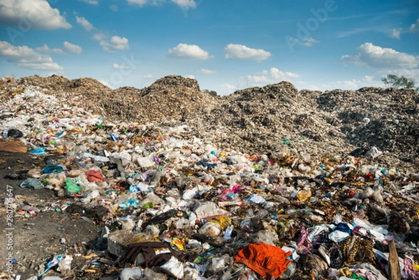 Fototapeta Mountain garbage, large garbage collection from urban communities and industrial areas Pollution of developing countries