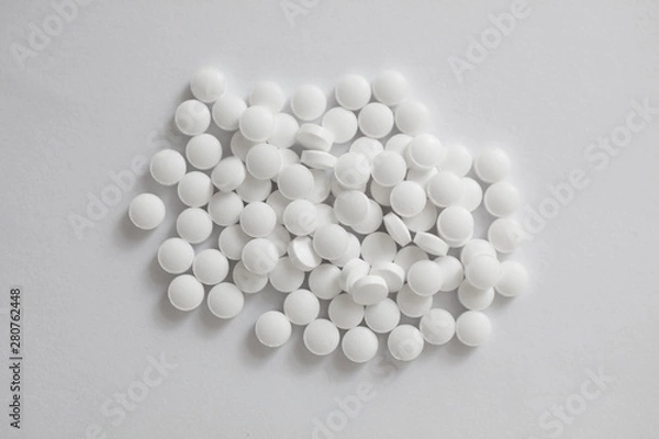 Fototapeta White tablets top view. Melatonin medicine.