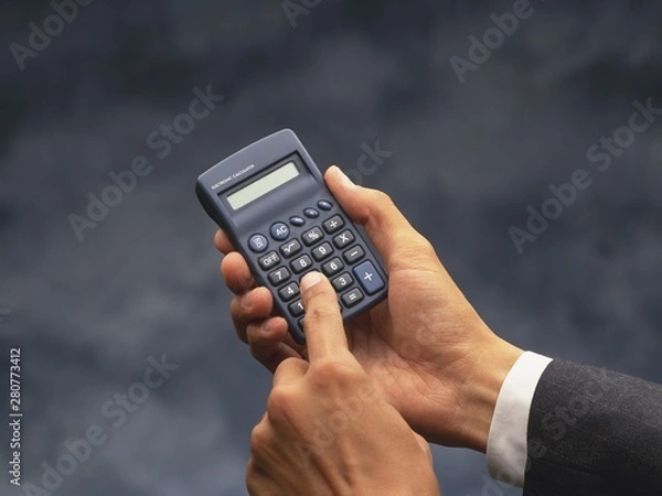 Obraz calculator in hand