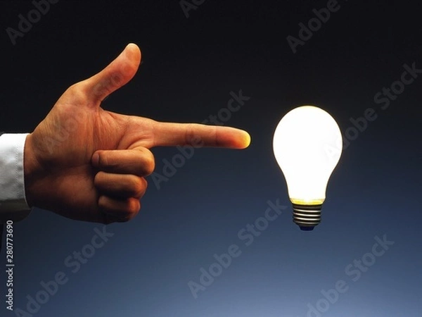 Obraz hand holding light bulb