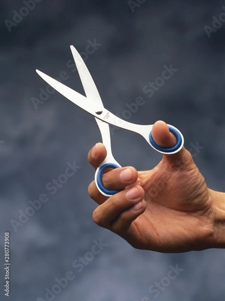Obraz scissors in hand