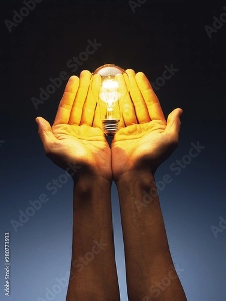 Obraz hand with lightbulb