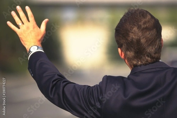 Obraz man with arms raised