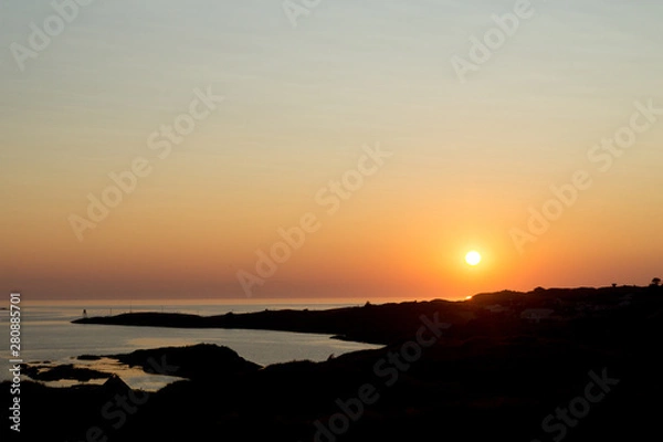 Fototapeta Sunset with landscape and sea