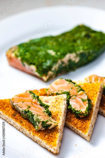 Fototapeta Still life of marinated salmon in dill