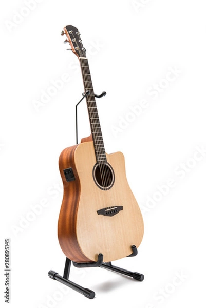 Obraz acoustic guitar with stand isolated on white background