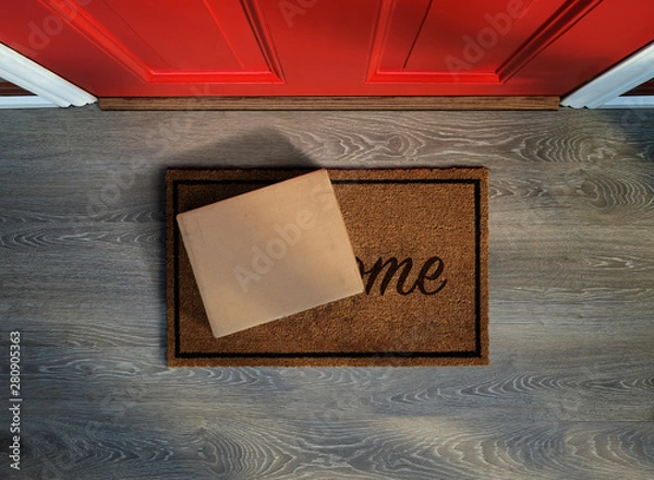 Obraz Delivered outside the door, e-commerce purchase on welcome mat. Add your own copy and label