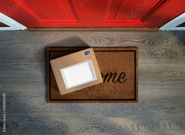 Obraz Delivered outside door, e-commerce purchase on welcome mat. Add your own copy and label