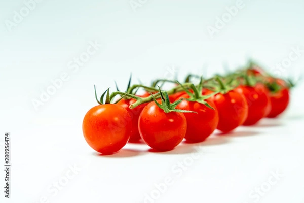 Obraz Fresh cherry tomatoes isolated on white background. 