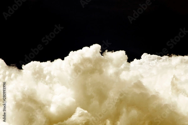 Obraz White clouds on a black background.