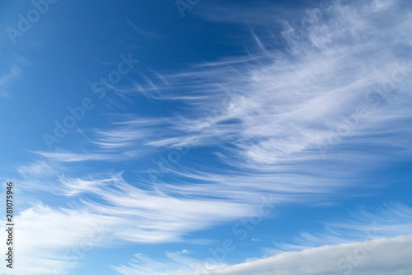 Fototapeta Beautiful blue sky with white fancy clouds