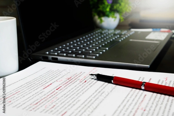Obraz blur proofreading sheet on table