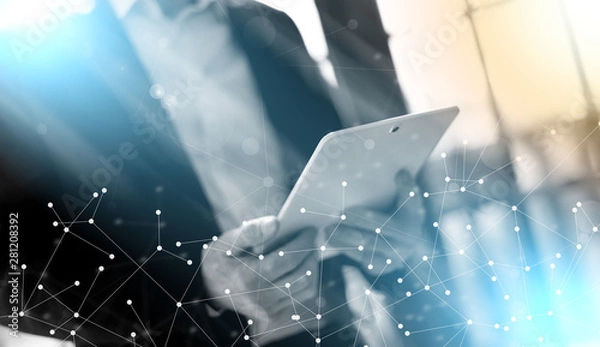 Obraz Businessman with tablet; light effect