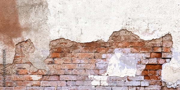 Fototapeta Background Of Old Vintage Dirty Brick Wall With Peeling Plaster, Texture. Shabby Building Facade With Damaged Plaster. Abstract Web Banner. Copy Space.