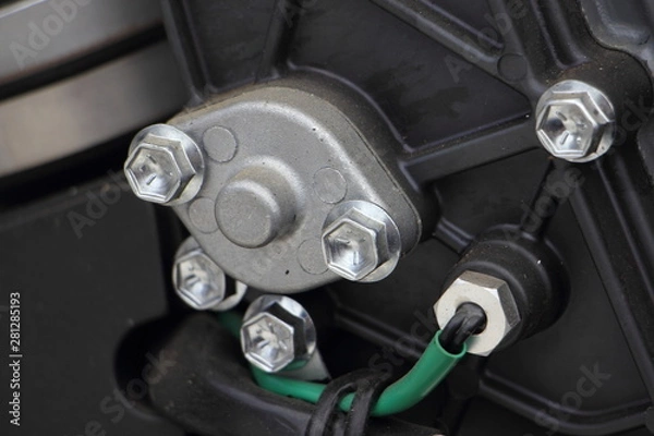 Fototapeta Close up thermostat and engine temperature sensor of boat outboard motor, repair and maintenance of the cooling system, overheating, emergency lamp operation