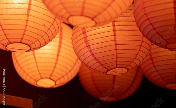 Obraz a round, bright orange lantern