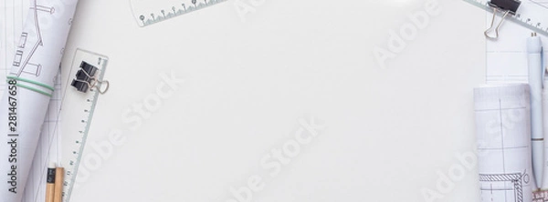 Fototapeta Architectural plans, pencil and ruler on the table. Place for your text.