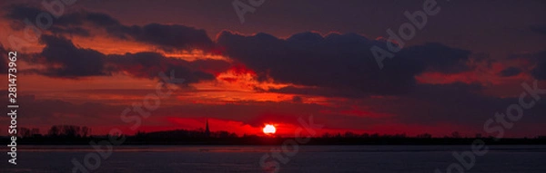 Fototapeta sunset over lake