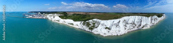 Obraz Aerial panorama of Port of Dover with ferry ships docked in passengers terminal and view over white cliffs, coastal countryside on a sunny summer day, south east England .