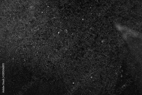 Fototapeta white dust and scratches on a black background. The texture of dirt on the glass.