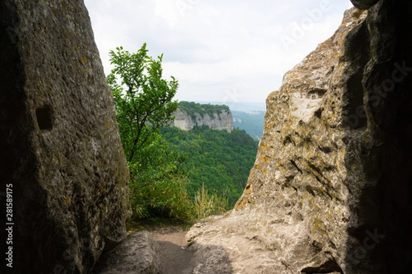 Obraz ancient city overgrown and lost in the wild