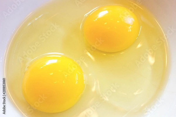 Obraz Close-Up Two Yolk On White Plate