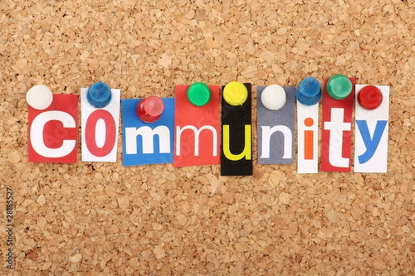 Fototapeta The word Community in magazine letters on a notice board