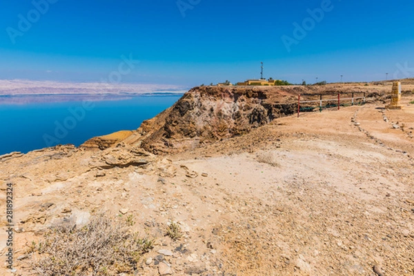 Fototapeta View from the Zara trail, near the Panorama Dead Sea Complex in Jordan. Zara Cliff Walk offers stunning views of the Dead Sea coast.