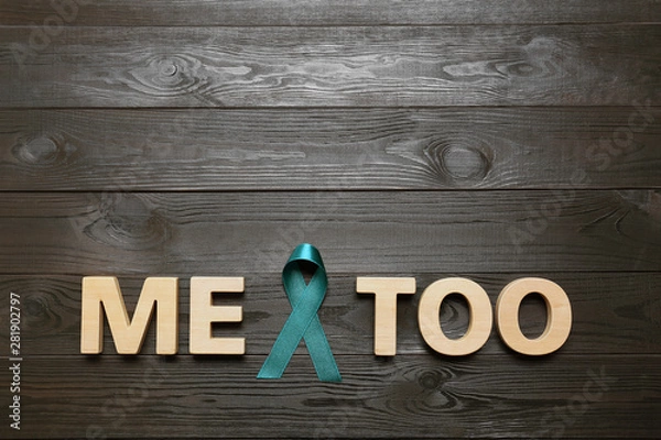 Fototapeta Phrase Me Too made of letters and teal awareness ribbon on wooden background, top view. Stop sexual assault