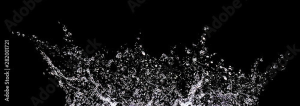 Fototapeta Splashes and drops of water on a black background. Abstract or background image, selective focus. Banner