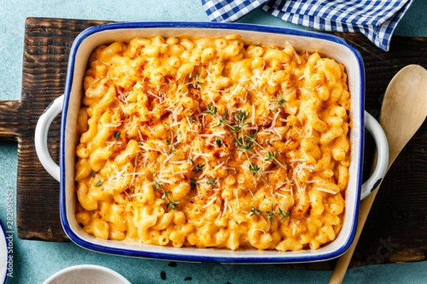 Obraz Mac and cheese. traditional american dish macaroni pasta and a cheese sauce