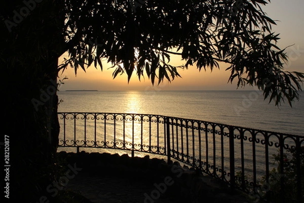Fototapeta sunset on beach