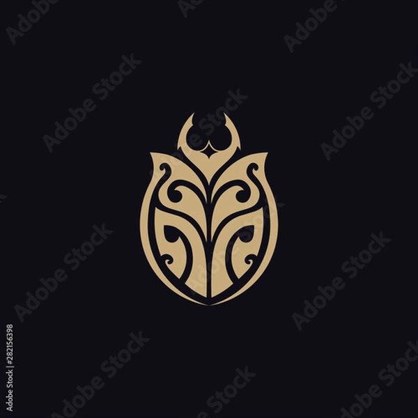 Fototapeta beetle with tribal tattoo logo vector design template
