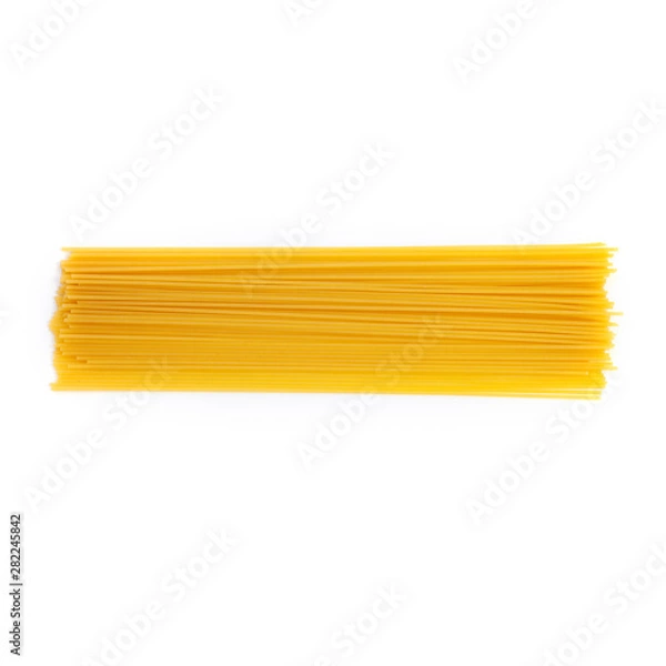 Obraz Raw pasta spaghetti isolated over white background