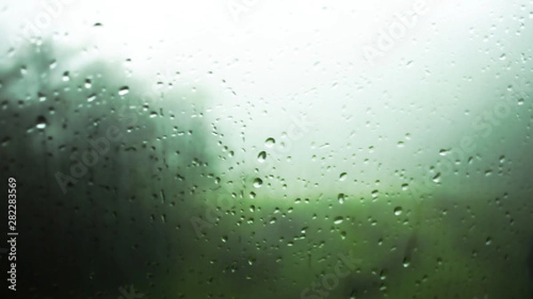 Obraz Watching rain from glass window