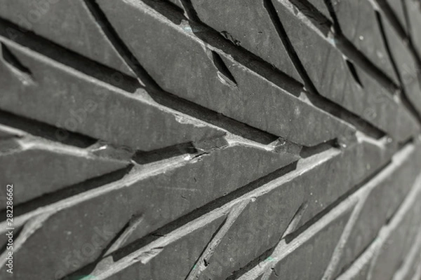 Obraz The texture of the used rubber tire. Car tire tread pattern
