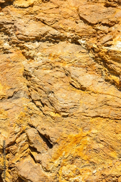 Fototapeta Abstract toned background. Natural stone texture. The pattern of roughened surface. Vintage texture. Widescreen