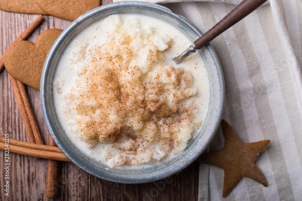 Fototapeta Rice pudding flat lay seen from above