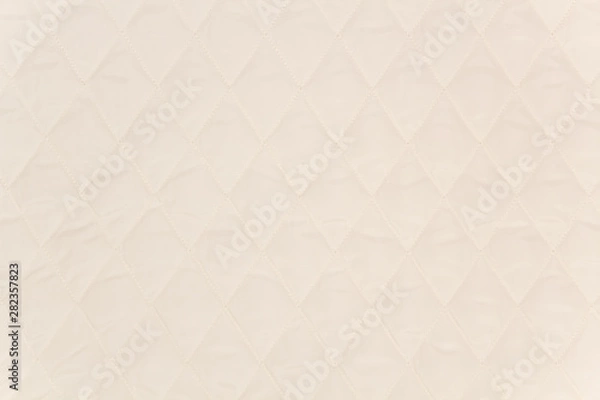Fototapeta Quilted fabric. The texture of the blanket.