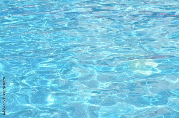 Fototapeta Surface of blue swimming pool. Background texture of water. - image